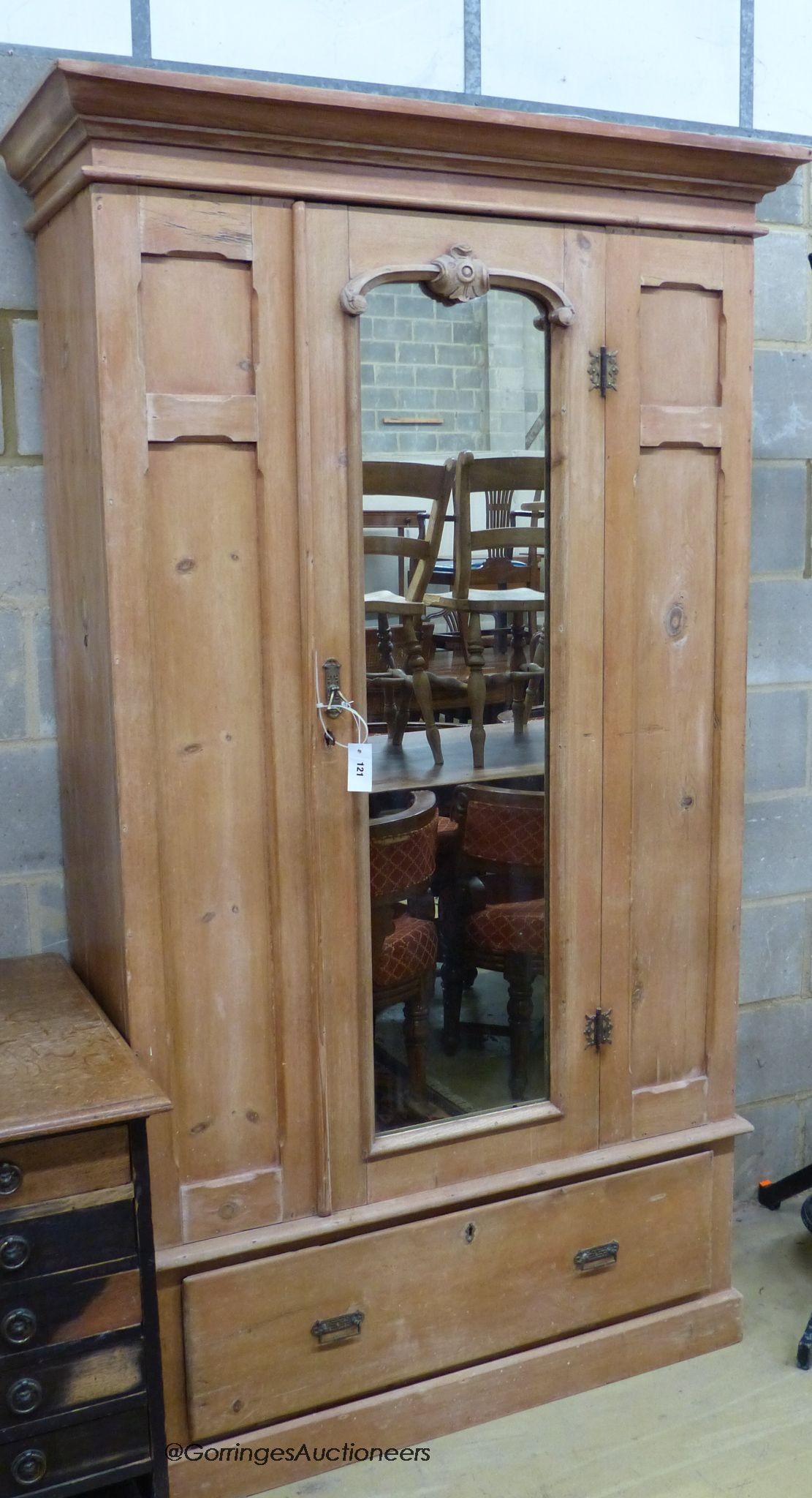 A Victorian pine mirrored door wardrobe, length 119cm, depth 48cm, height 206cm